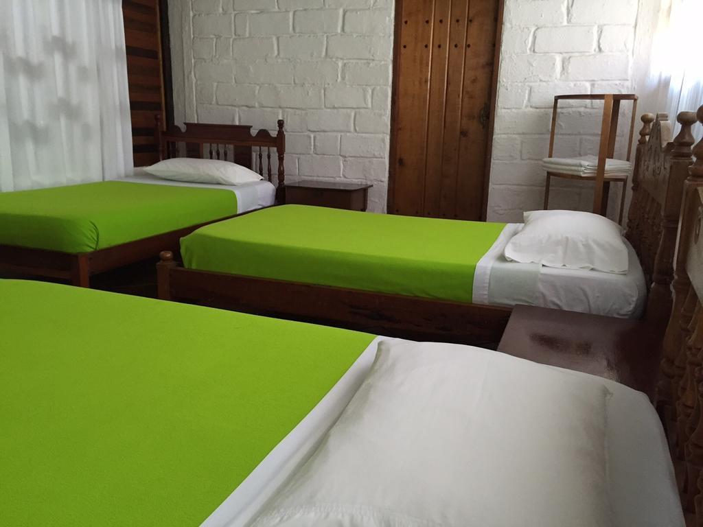 Hostal El Paisano Puerto Misahuallí Rum bild