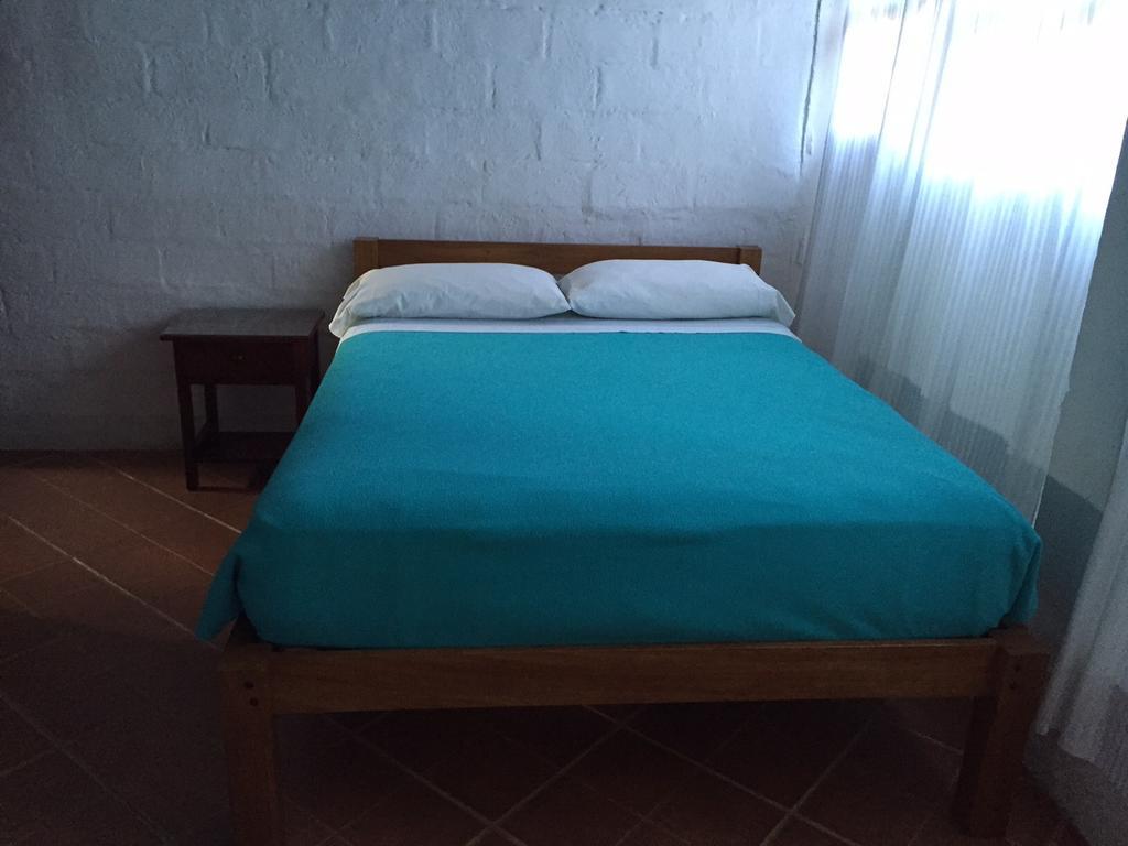 Hostal El Paisano Puerto Misahuallí Rum bild
